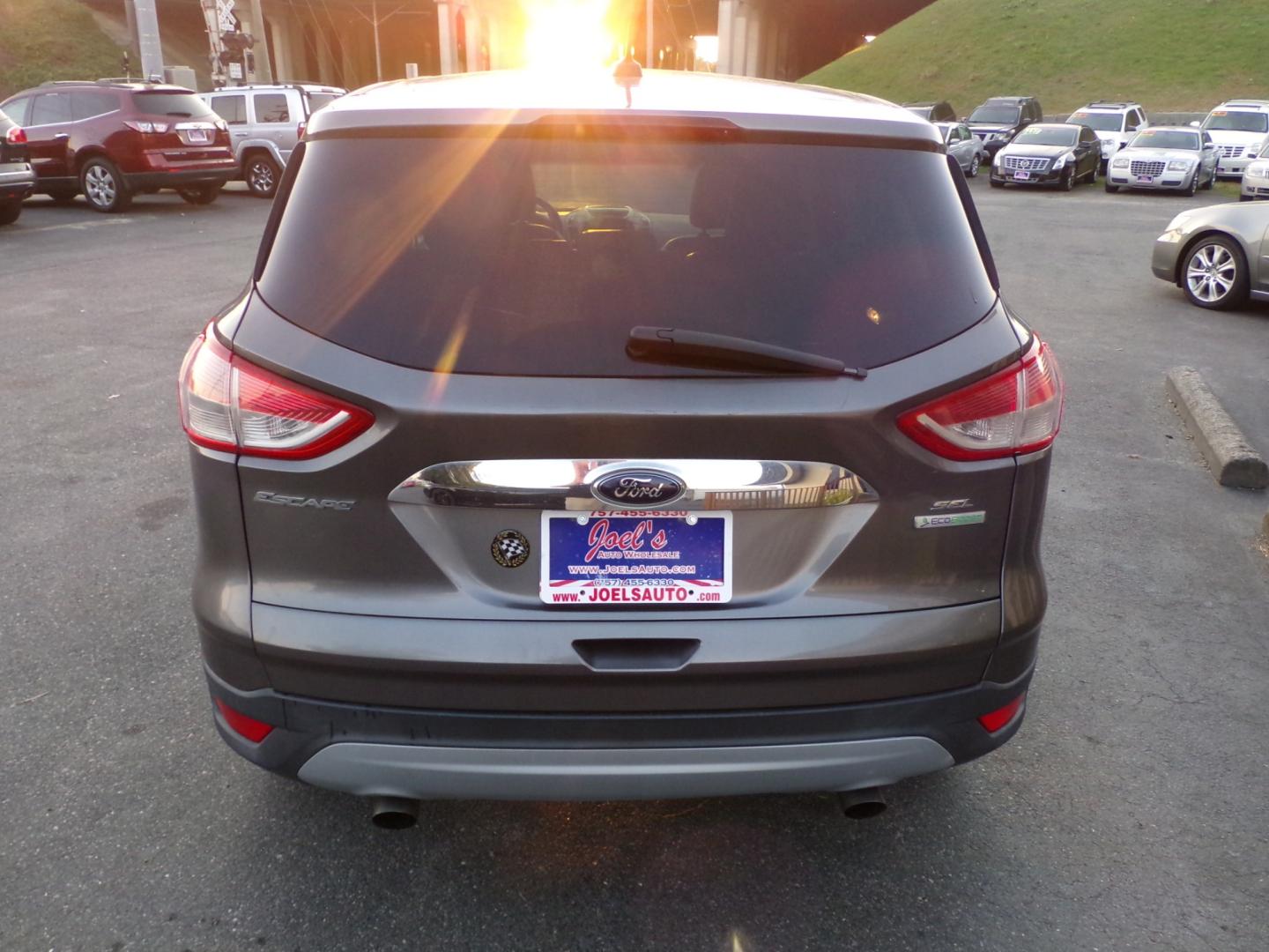 2013 Grey Ford Escape SEL FWD (1FMCU0H96DU) with an 2.0L L4 DOHC 16V engine, 6-Speed Automatic transmission, located at 5700 Curlew Drive, Norfolk, VA, 23502, (757) 455-6330, 36.841885, -76.209412 - Photo#12